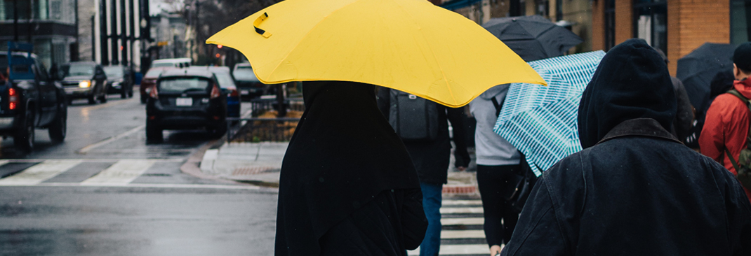 Yellow umbrella - 6 Tips on How to Survive the Rainy Days